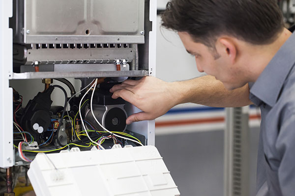 hvac repair technician at work