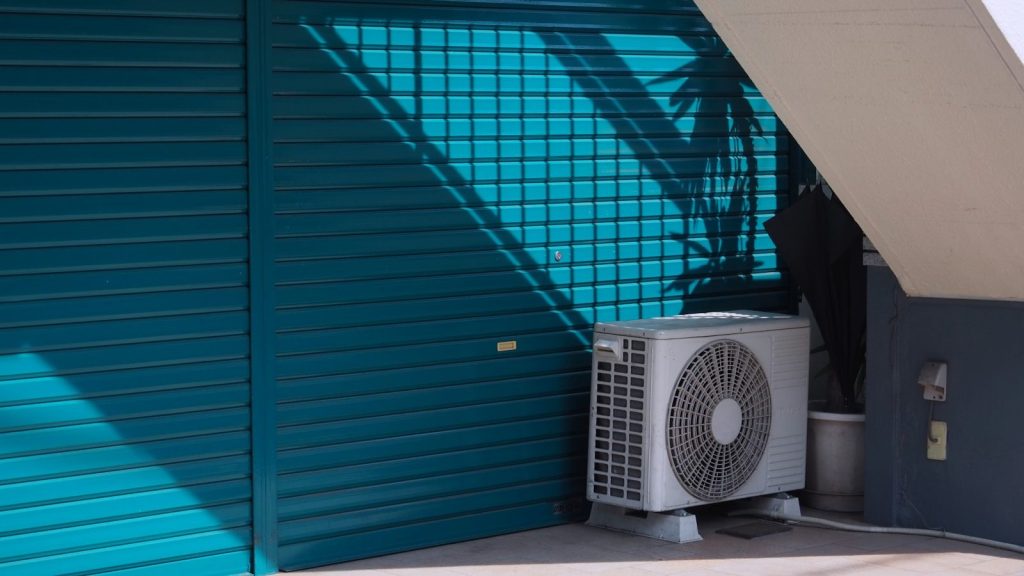 A air conditioner sitting outside of a building for Professional Air Conditioning Services in Lynn Haven, FL