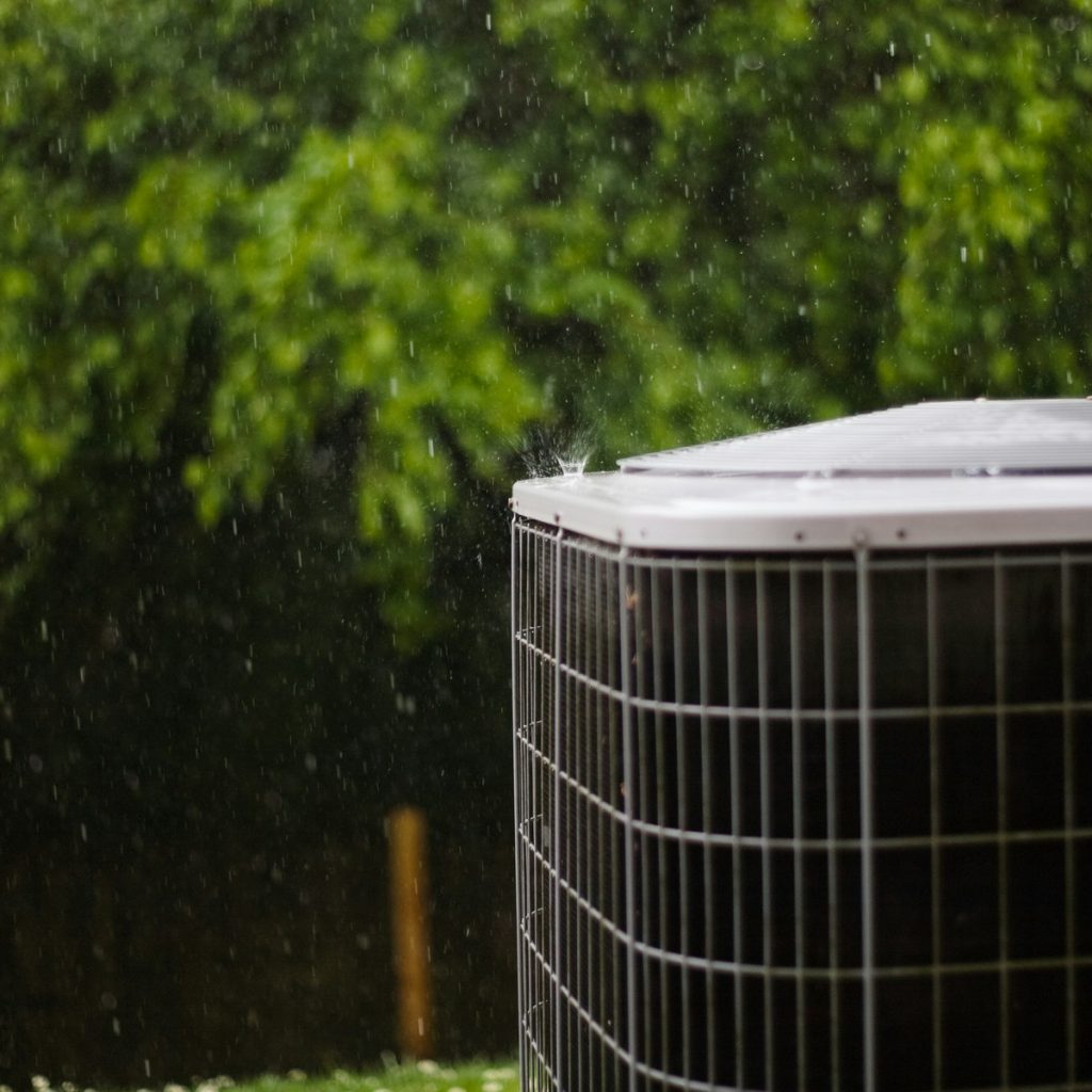 A freshly installed outdoor condenser running quietly beside a home, exactly what you'd expect when booking Heating and HVAC System Services near me.